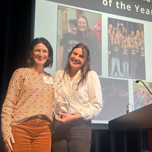 Elizabeth Schorr accepts 2024 Educator of the Year Award from Marissa O'Donnell